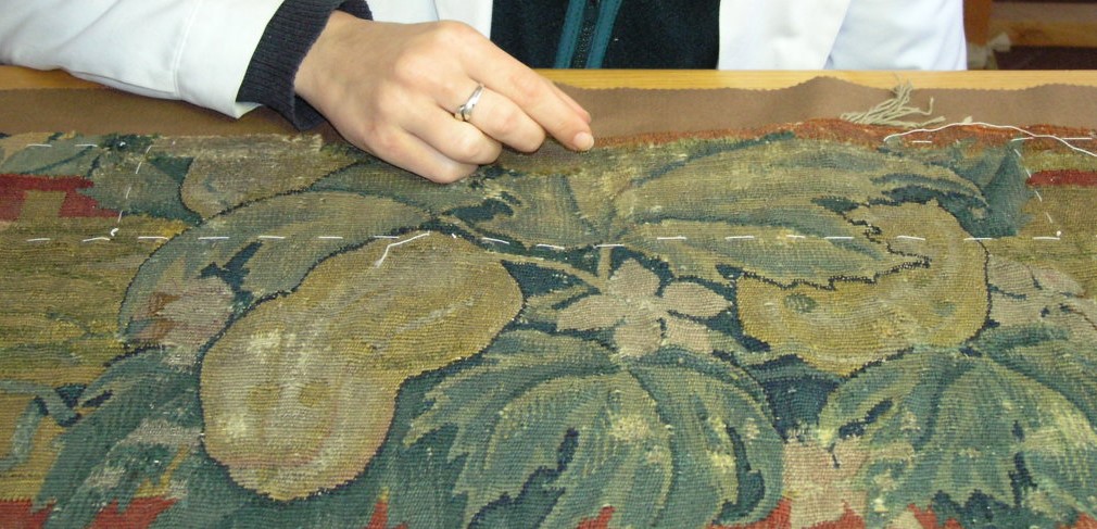 restauro tappeto antico